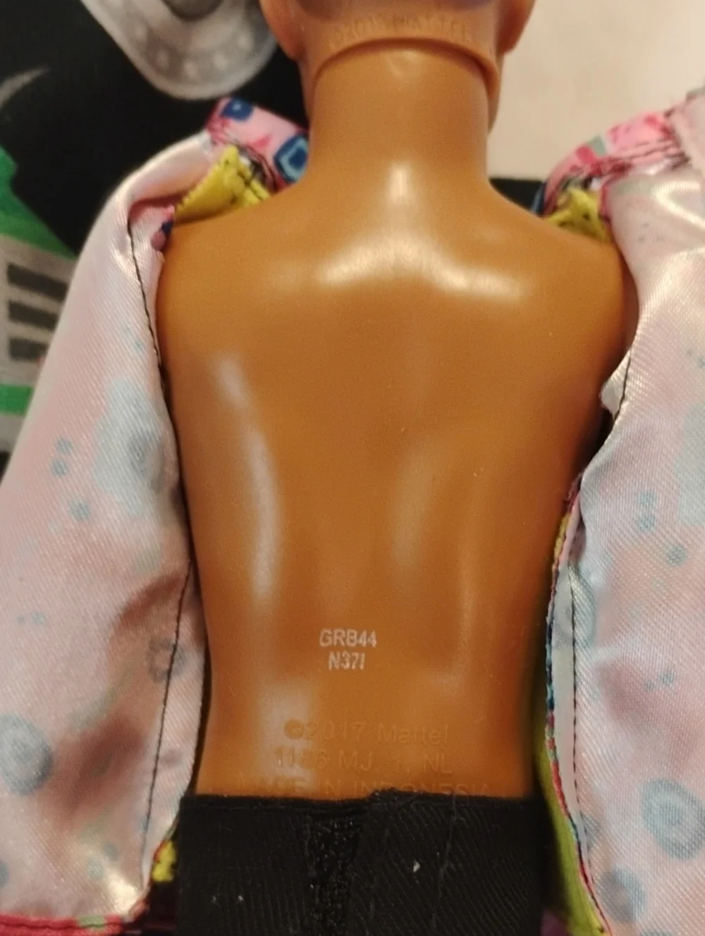 Mattel Ken-Style Doll with Pink Patterned Jacket and Yellow Tee